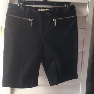 Black Bermuda right above the knee shorts
